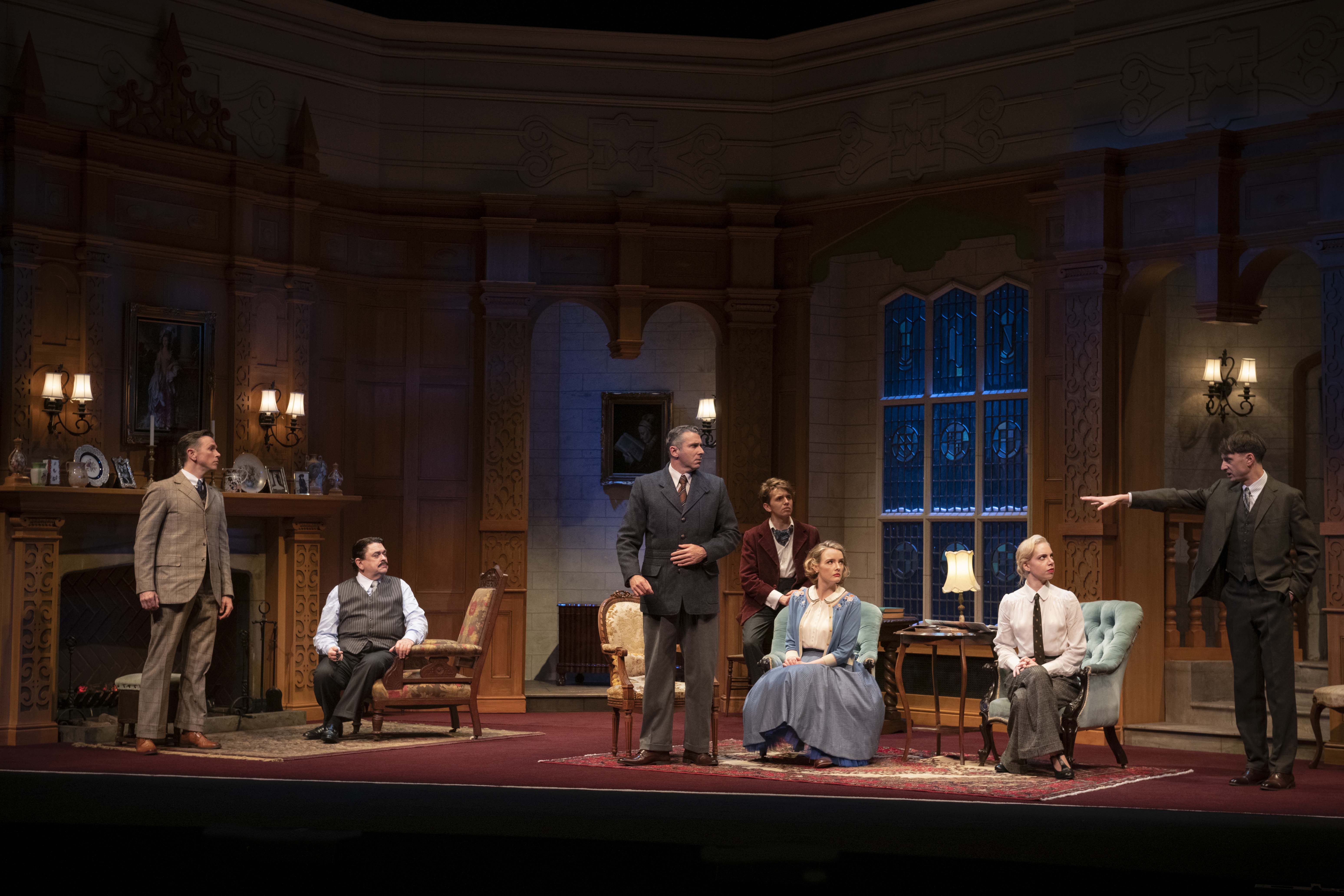 The 2022 Cast of Agatha Christie's The Mousetrap on stage.