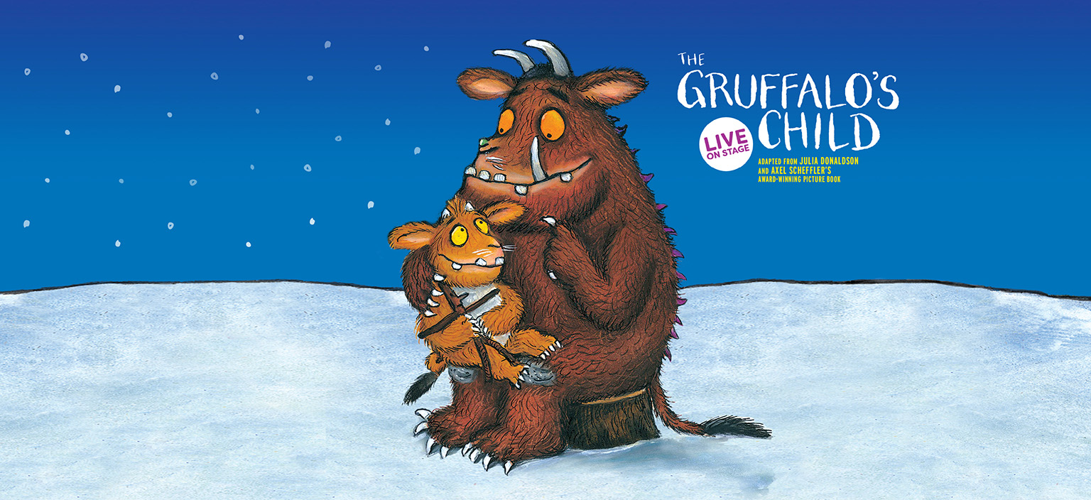 An illustration of the Gruffalo holding a smaller Gruffalo on its lap